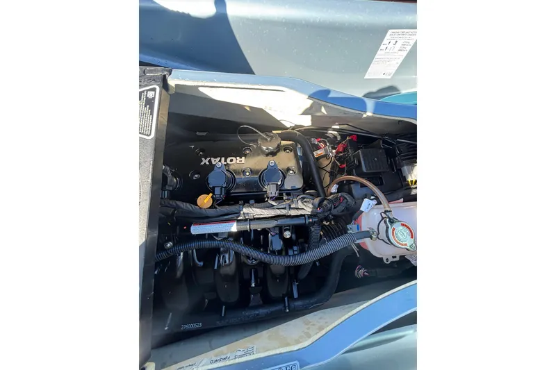 Slide: The Image of 2023 Sea-Doo GTI 130 engine compartment showcasing Rotax engine components. - 37