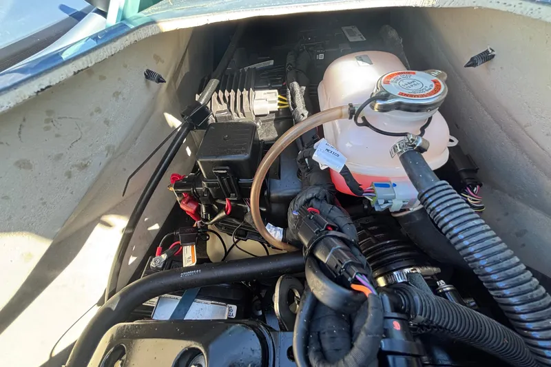 Slide: The Image of Engine compartment of 2023 Sea-Doo GTI 130, showcasing internal components and wiring. - 38