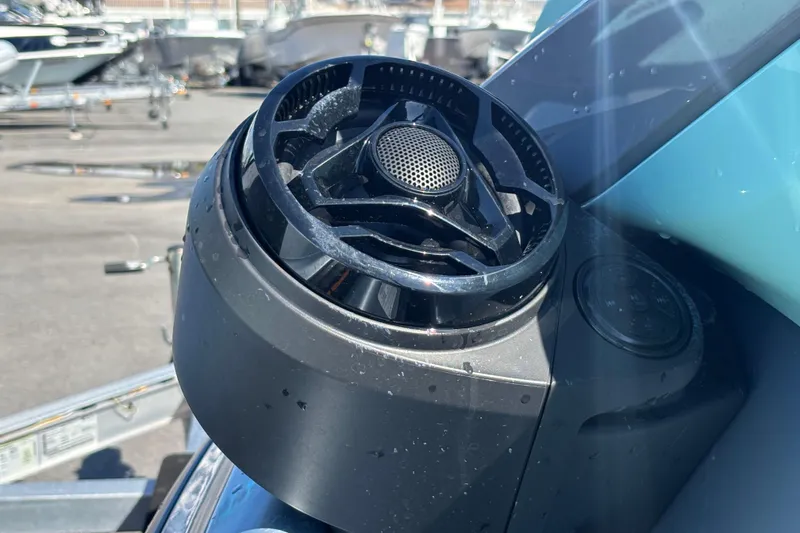 Slide: The Image of Close-up of 2023 Sea-Doo GTI 130 speaker system on a sunny day. - 45