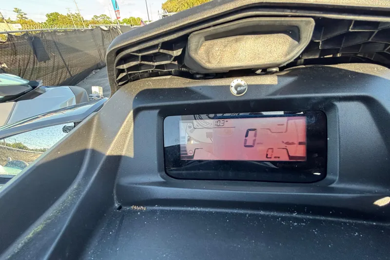 Slide: The Image of 2023 Sea-Doo GTI 130 dashboard display showing zero RPM in sunlight. - 47
