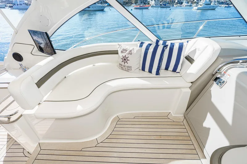 Slide: The Image of Luxurious seating area on a 2005 Sea Ray 480 Sundancer yacht. - 37