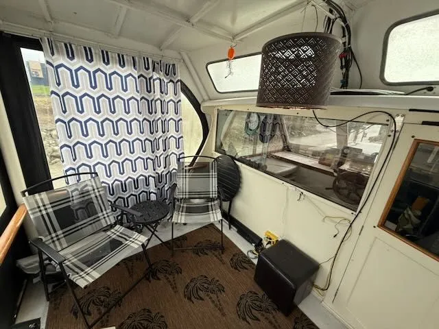 Slide: The Image of 1982 Rough Water 41 Pilothouse control panel with Garmin devices. - 19