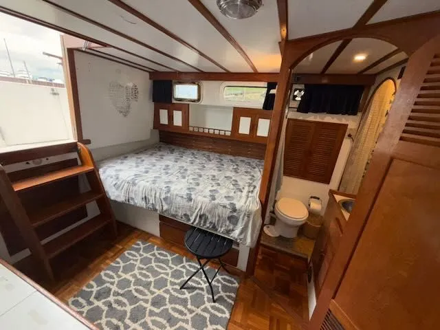 Slide: The Image of Engine of a 1982 Rough Water 41 Pilothouse, close-up view. - 25