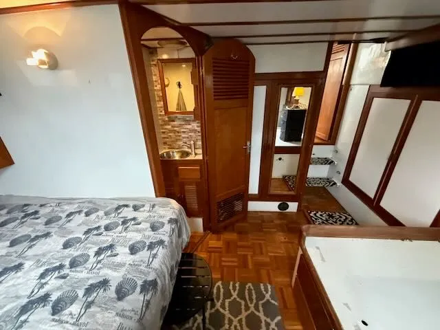 Slide: The Image of Engine room of a 1982 Rough Water 41 Pilothouse. - 26