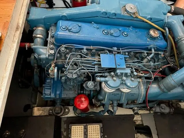 Slide: The Image of Engine room of 1982 Rough Water 41 Pilothouse with motor and wiring. - 28