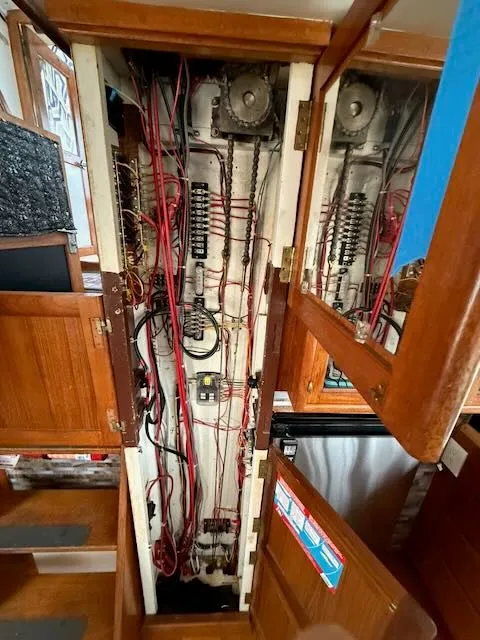 Slide: The Image of Deck of a 1982 Rough Water 41 Pilothouse boat in harbor. - 33