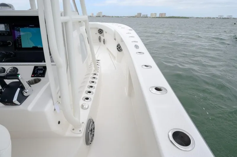 Slide: The Image of 2024 SeaVee 370Z boat interior with control panel and ocean view. - 11