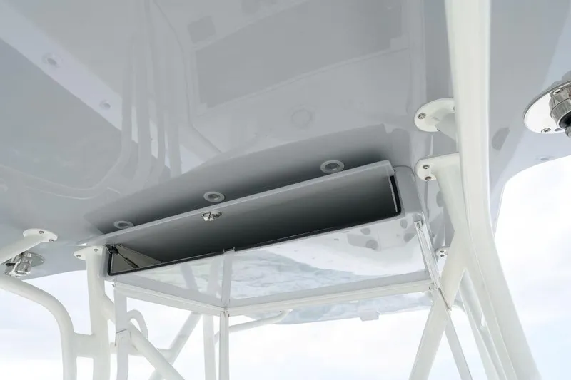 Slide: The Image of 2024 SeaVee 370Z boat's overhead compartment, showcasing sleek design and functionality. - 12
