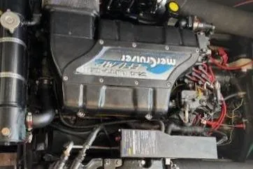 Slide: The Image of 1996 Sea Ray 400 Sedan Bridge bathroom with shower, sink, and mirror. - 12