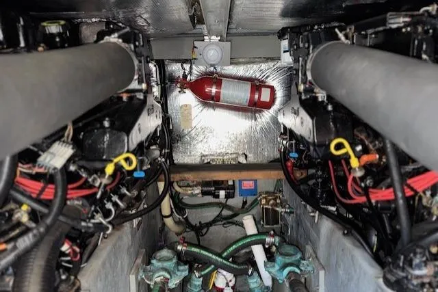 Slide: The Image of SmartSolar charge controller in 1996 Sea Ray 400 Sedan Bridge yacht engine room. - 27