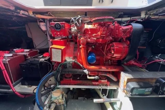 Slide: The Image of Engine room of a 1996 Sea Ray 400 Sedan Bridge with ProTech 1240i Plus charger. - 31