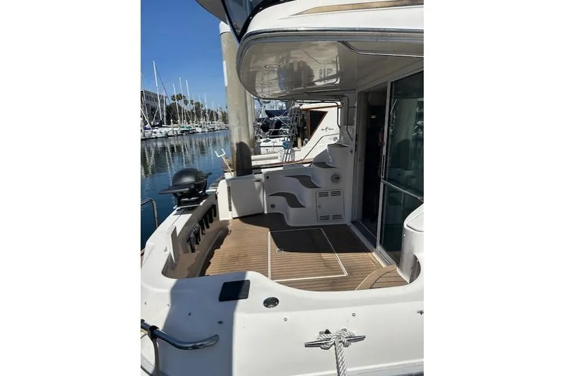 Slide: The Image of Engine compartment of a 1996 Sea Ray 400 Sedan Bridge boat, showing mechanical components. - 34