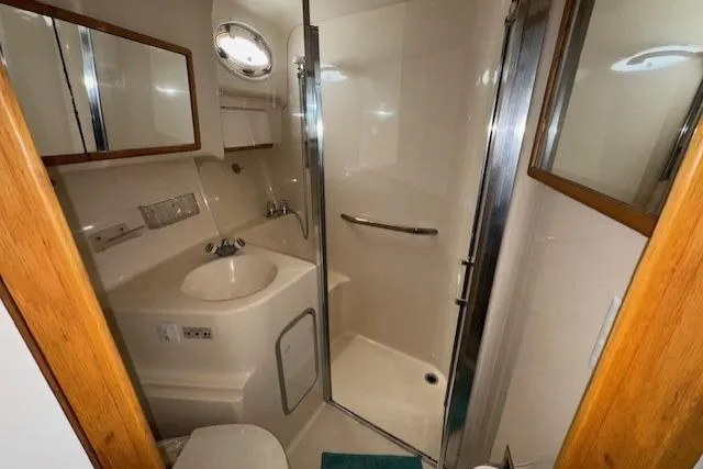 Slide: The Image of Interior of 1996 Sea Ray 400 Sedan Bridge yacht with kitchenette and appliances. - 6