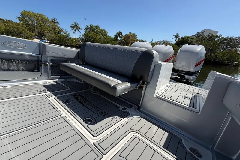 Slide: The Image of 2018 Nor-Tech 390 Sport Center Console boat with seating and Mercury engines. - 10