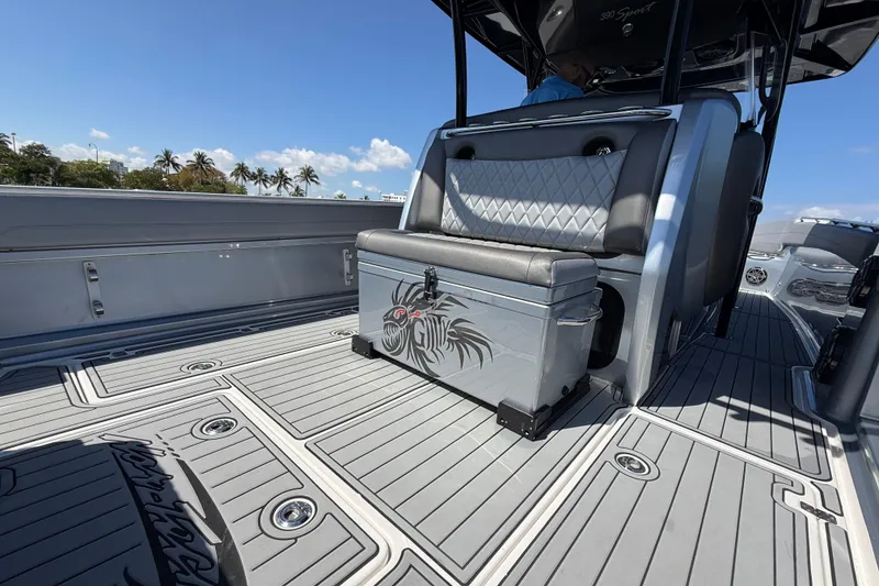 Slide: The Image of 2018 Nor-Tech 390 Sport Center Console boat interior with stylish seating and deck design. - 12