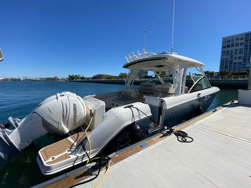 The Image of 2019 Boston Whaler 320 Vantage docked on a sunny day. - 0