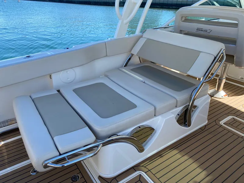Slide: The Image of Boston Whaler 320 Vantage 2019, luxurious seating on boat. - 12