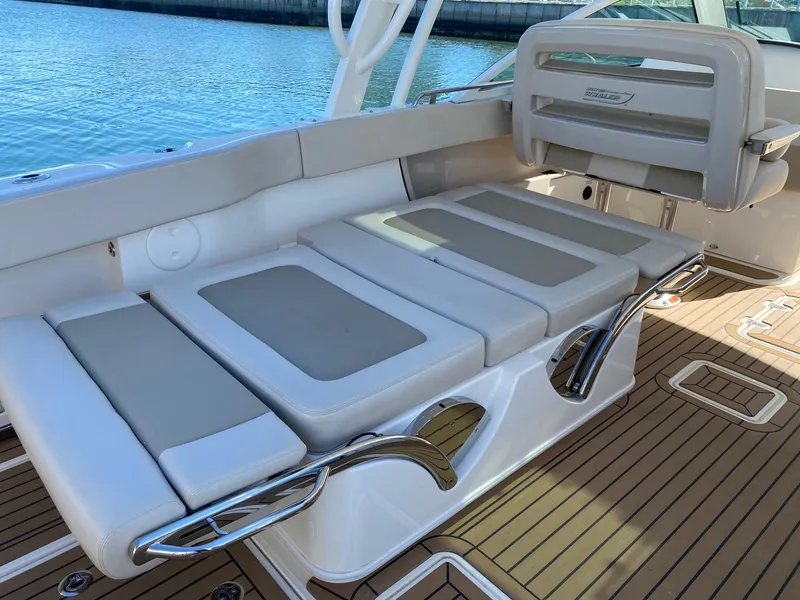 Slide: The Image of Boston Whaler 320 Vantage 2019, luxurious seating on teak deck. - 13