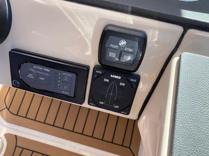 Slide: The Image of Control panel of a 2019 Boston Whaler 320 Vantage boat. - 23