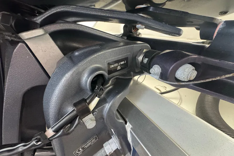 Slide: The Image of Close-up of mechanical components on a 2023 Wellcraft 242 Fisherman boat. - 14