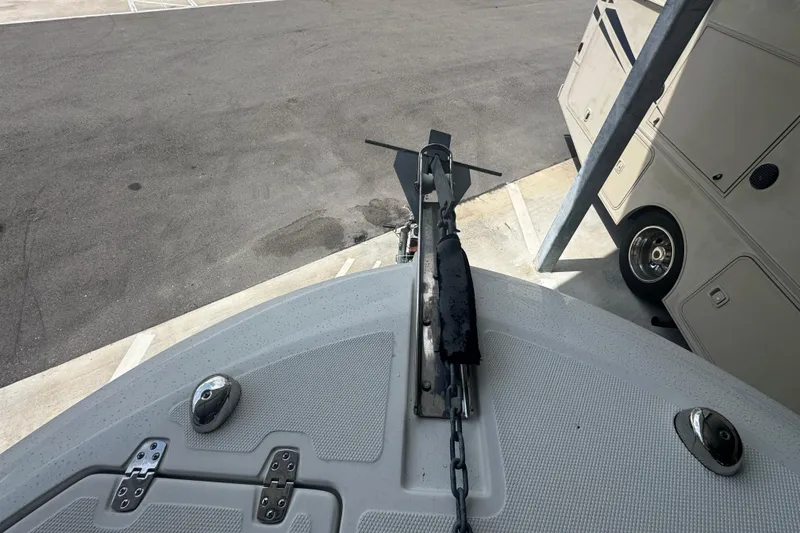 Slide: The Image of Bow view of 2023 Wellcraft 242 Fisherman boat with anchor and chain. - 46