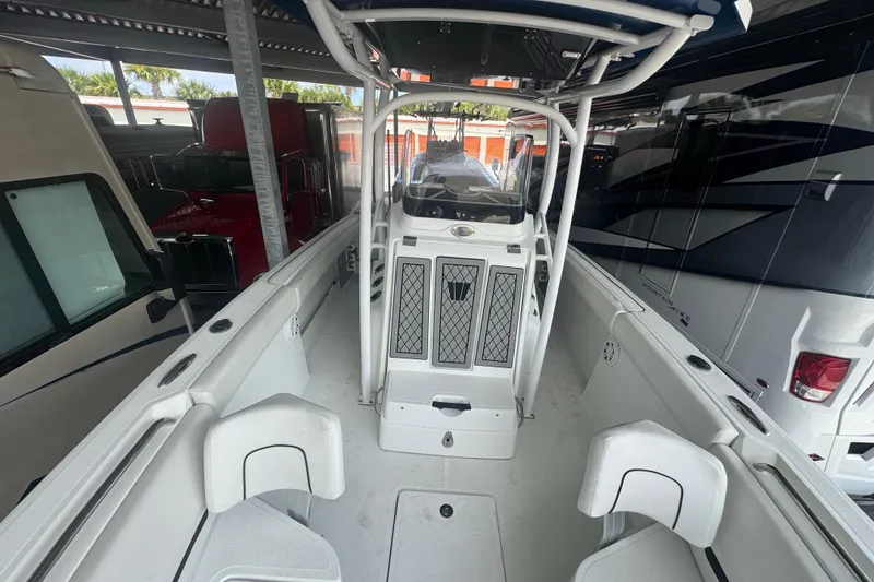 Slide: The Image of 2023 Wellcraft 242 Fisherman boat interior, featuring spacious seating and modern design. - 51