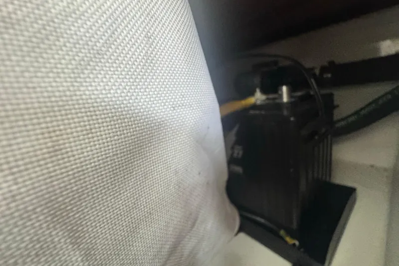 Slide: The Image of Interior view of 2023 Wellcraft 242 Fisherman boat, showing equipment and wiring. - 58