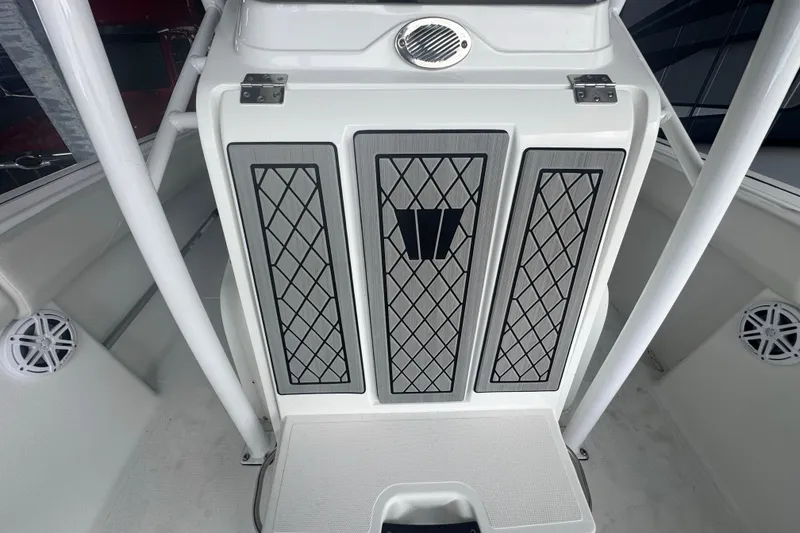 Slide: The Image of 2023 Wellcraft 242 Fisherman boat interior with stylish panel design and speaker system. - 62