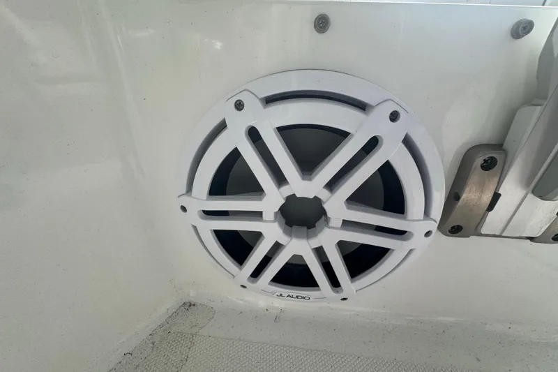 Slide: The Image of Speaker on 2023 Wellcraft 242 Fisherman boat, featuring JL Audio marine sound system. - 63