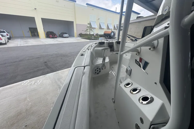 Slide: The Image of 2023 Wellcraft 242 Fisherman boat interior at a dockside location. - 66