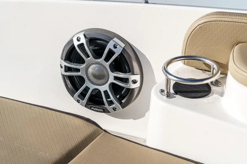 Slide: The Image of 2023 Sea Ray Sundancer 320 OB speaker and cup holder detail. - 28