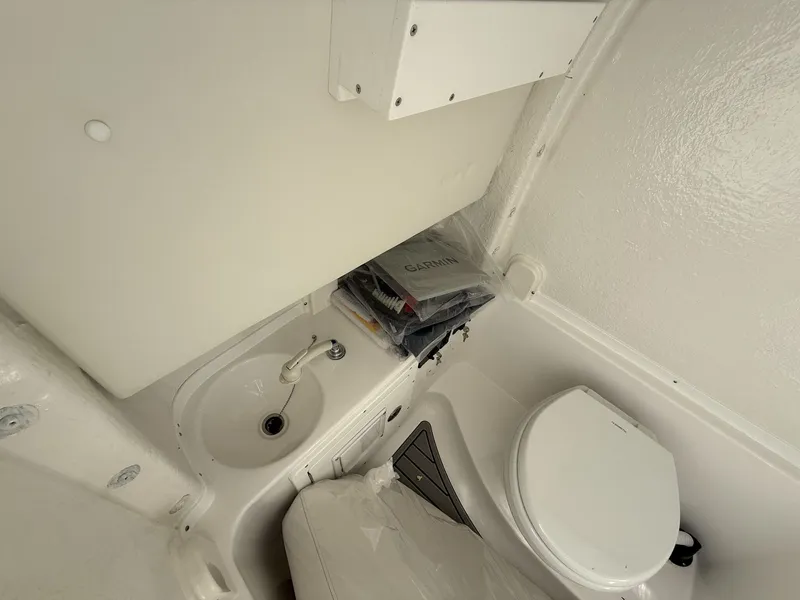 Slide: The Image of Interior of 2026 Tidewater 282 CC Adventure with sink and toilet. - 11