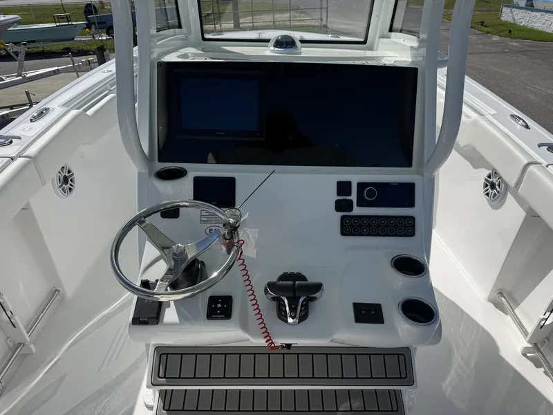 Slide: The Image of Helm console of the 2026 Tidewater 282 CC Adventure. - 14