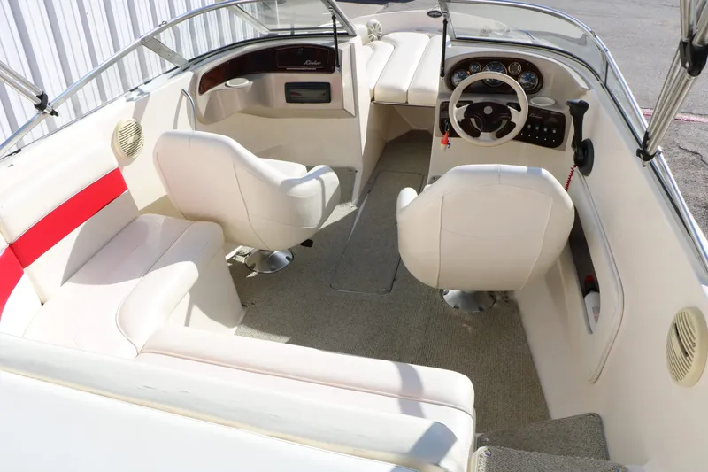 Slide: The Image of Interior of a 2002 Rinker Captiva 192 Liberty Edition boat. - 16