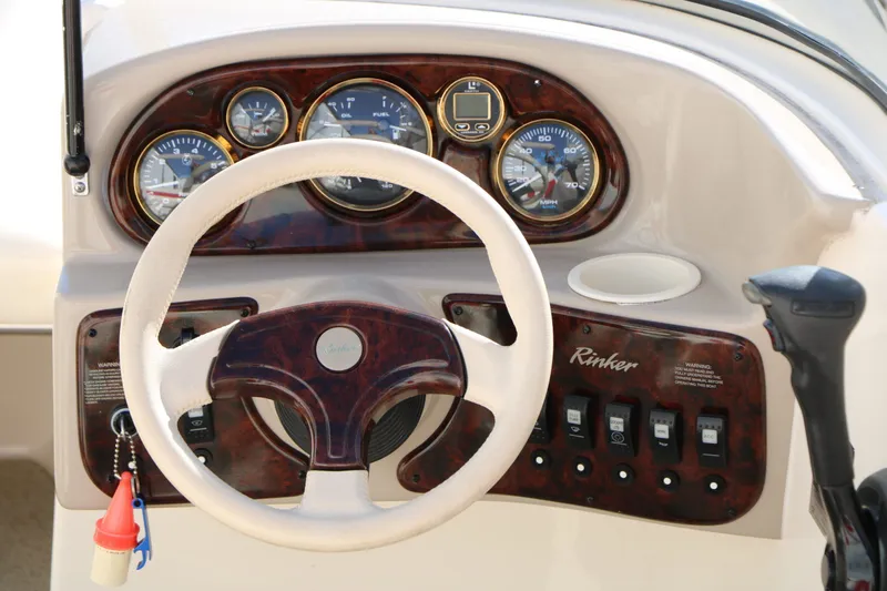 Slide: The Image of Dashboard of a 2002 Rinker Captiva 192 Liberty Edition boat. - 17