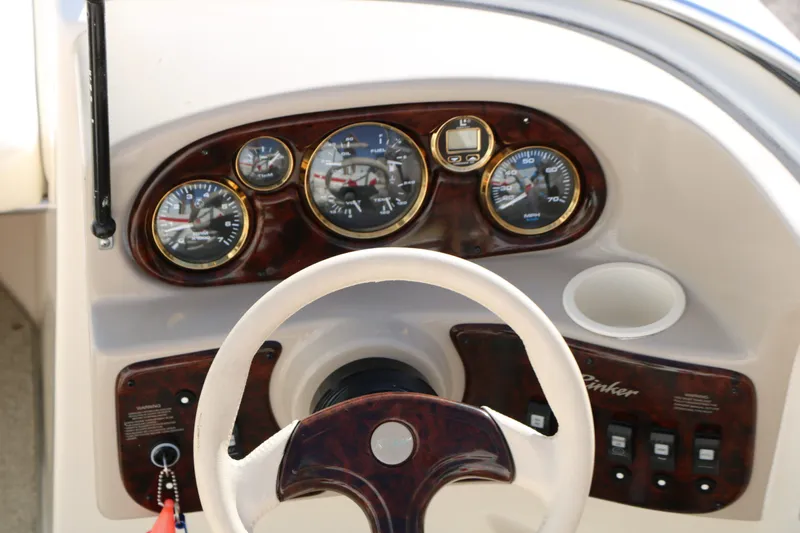 Slide: The Image of Dashboard of a 2002 Rinker Captiva 192 Liberty Edition boat. - 22