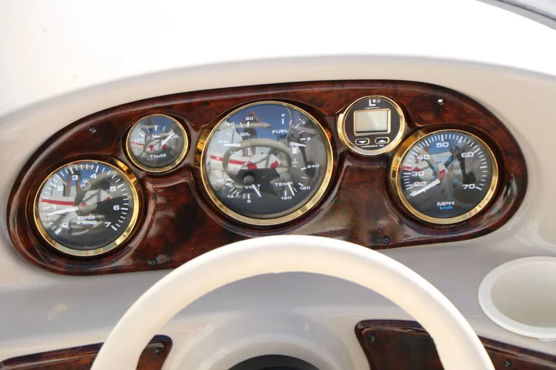 Slide: The Image of Dashboard of a 2002 Rinker Captiva 192 Liberty Edition boat. - 23