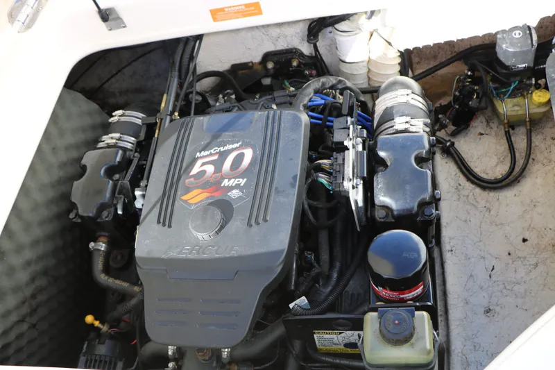 Slide: The Image of Engine of a 2002 Rinker Captiva 192 Liberty Edition boat. - 29