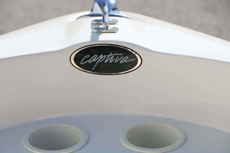 Slide: The Image of Close-up of Rinker Captiva 192 Liberty Edition boat emblem. - 35