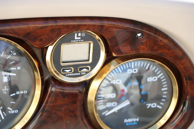 Slide: The Image of Dashboard of a 2002 Rinker Captiva 192 Liberty Edition boat. - 36
