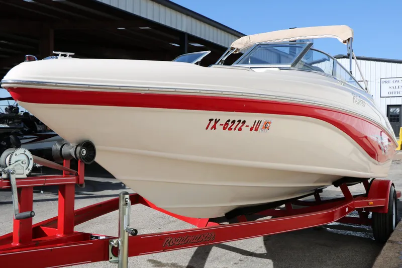 Slide: The Image of 2002 Rinker Captiva 192 Liberty Edition on red trailer. - 5