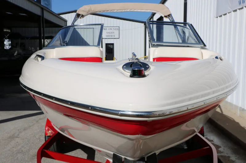 Slide: The Image of 2002 Rinker Captiva 192 Liberty Edition boat, front view. - 6