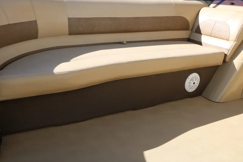 Slide: The Image of Interior of Crest 200 Classic Fish 2020 with beige seating area. - 16