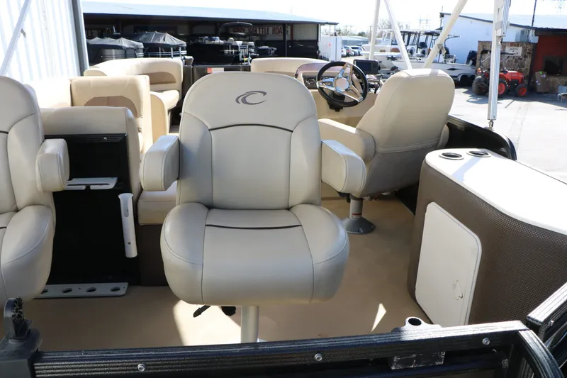 Slide: The Image of Interior of a 2020 Crest 200 Classic Fish boat with beige seating. - 20
