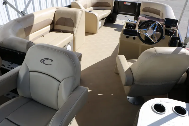 Slide: The Image of Interior of a 2020 Crest 200 Classic Fish boat with beige seating. - 22