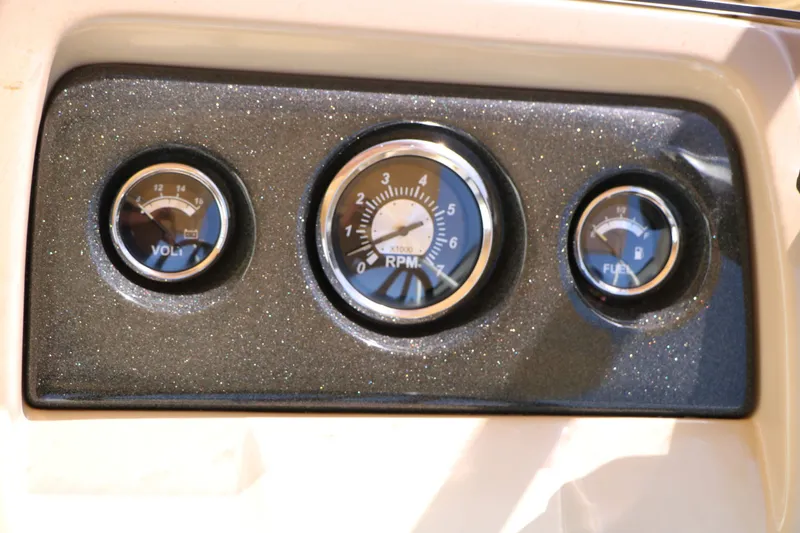 Slide: The Image of Dashboard of 2020 Crest 200 Classic Fish with voltmeter, RPM gauge, and fuel indicator. - 35