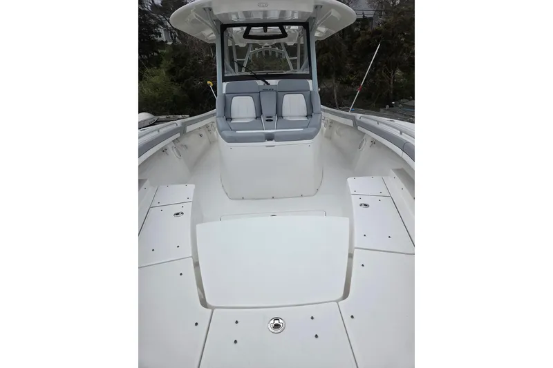 Slide: The Image of 2019 Regulator 41 boat interior with spacious seating and sleek design. - 15