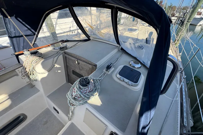 Slide: The Image of 1991 Island Packet Yachts 38 cockpit with ropes and navigation equipment. - 12