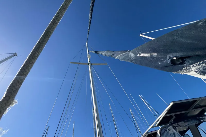 Slide: The Image of Sailboat mast and rigging of 1991 Island Packet Yachts 38 against clear blue sky. - 20