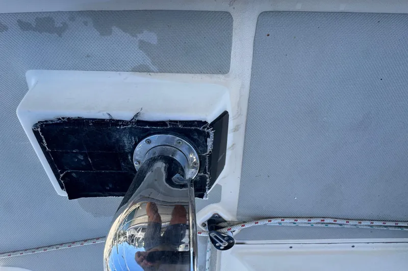 Slide: The Image of Close-up of a 1991 Island Packet Yachts 38 deck fitting with visible wear. - 21